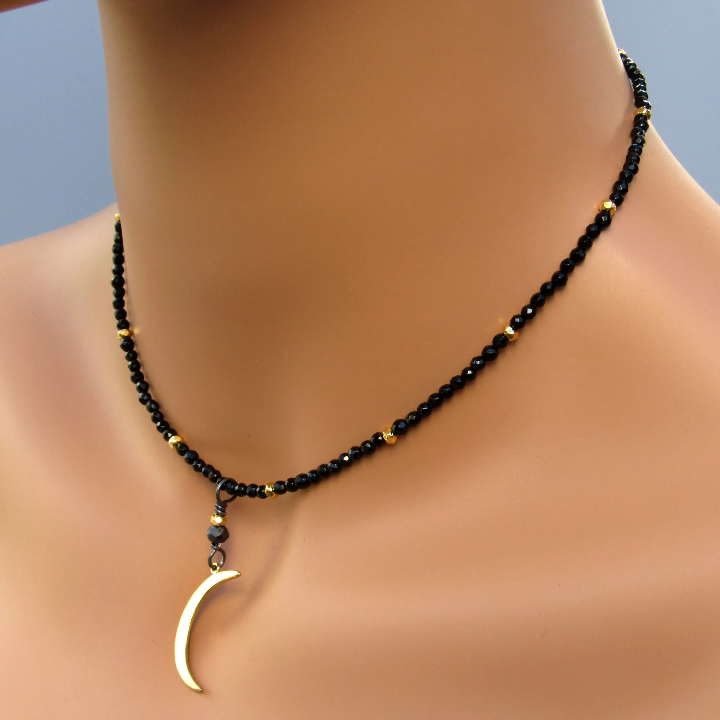 Black onyx, gold vermeil over sterling silver Moon and beads. Black non conflict diamond